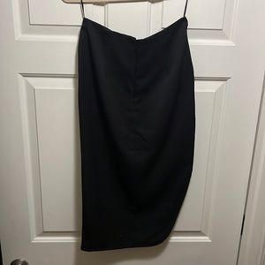 High Low asymmetrical skirt with wrap detail.